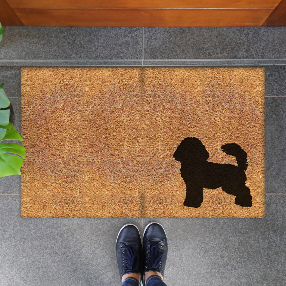 Natural coir doormat with a black Cavoodle dog silhouette in the lower corner