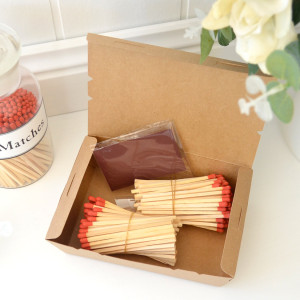 Brown Vintage Matches refill box tied with twine and replacement striker strip