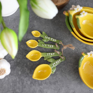 Set 4 Limone Measuring Spoons, a functional utensil for food preparation, serving or household use