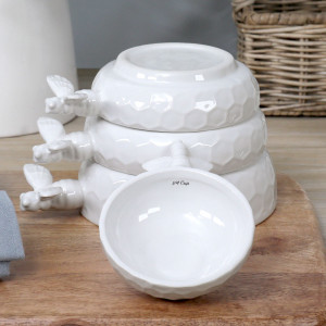 Set 4 Honeyfield White Bee Measuring Cups, a drinkware piece designed for serving beverages at the table