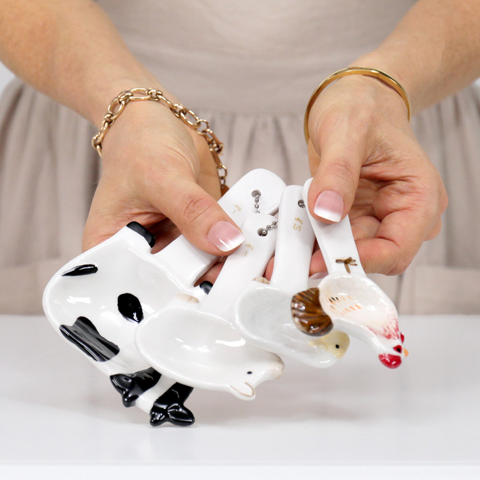 Set 4 Farmhouse Animals Measuring Spoons, a functional utensil for kitchen or household use