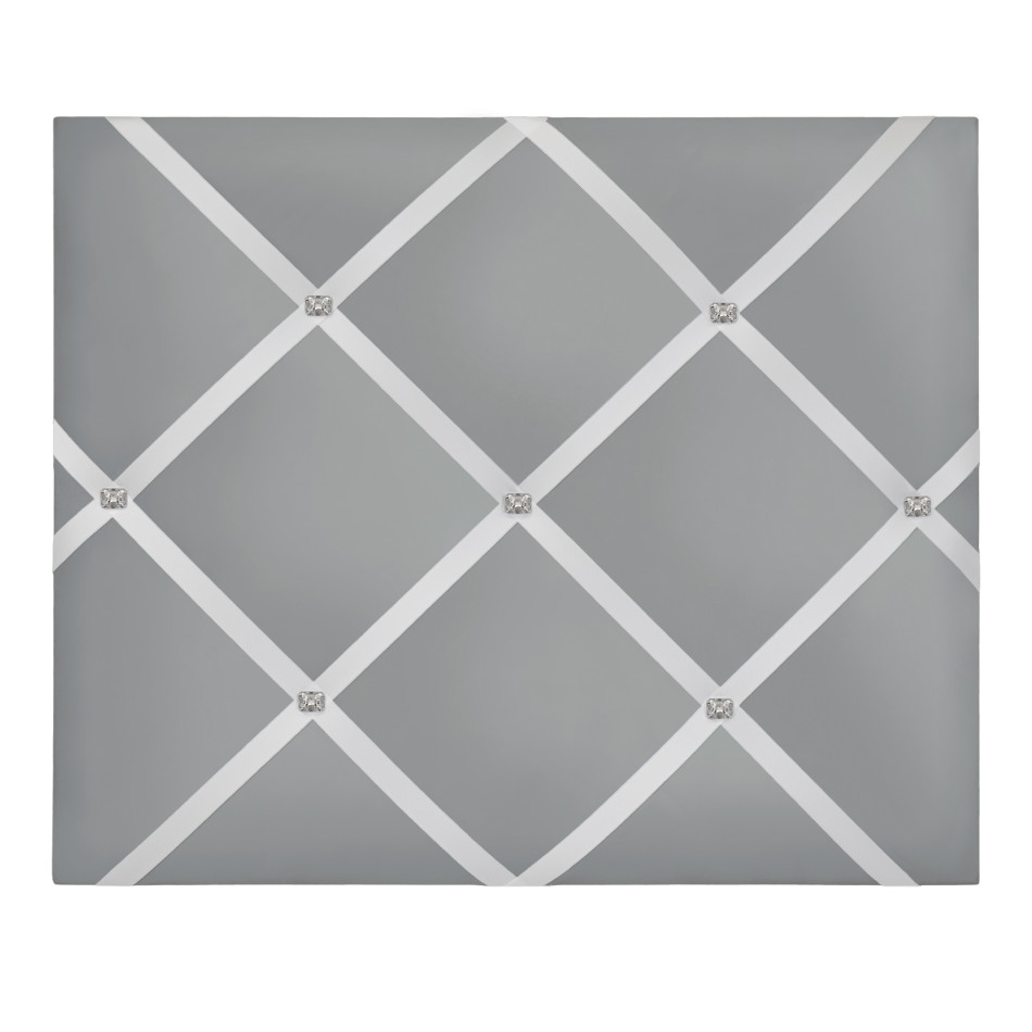 Silver fabric-covered wall organiser with a decorative crossed ribbon grid