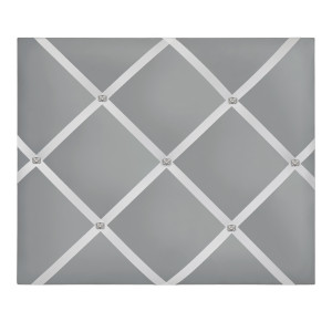Silver fabric-covered wall organiser with a decorative crossed ribbon grid