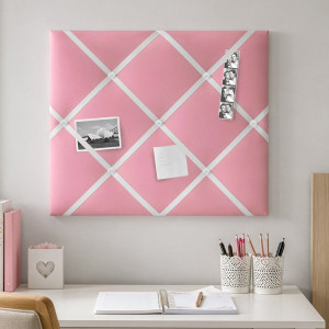 Candy-pink fabric memo board with white satin ribbon and white buttons