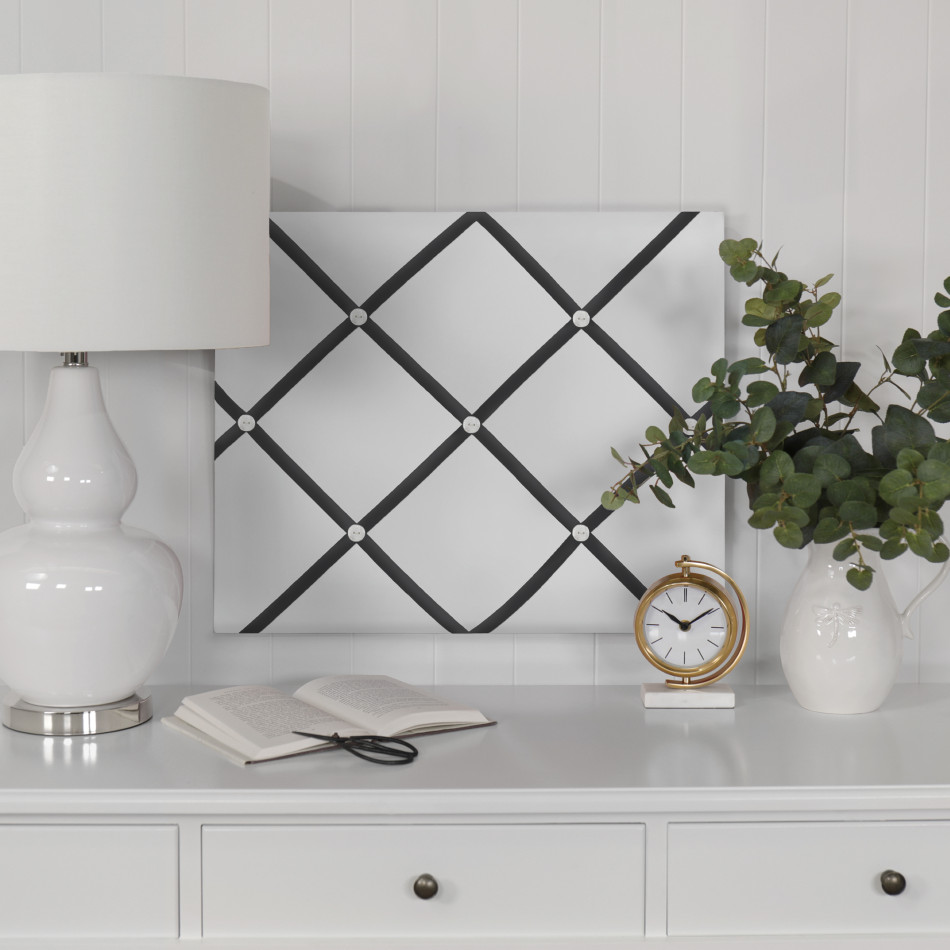 Classic black and white ribbon memo board with a fabric-covered display surface