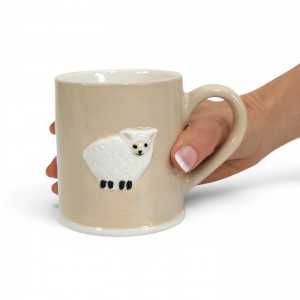Animal Friends Sheep Mug, a drinkware piece designed for serving beverages at the table
