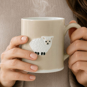 Animal Friends Sheep Mug, a practical vessel for drinks with decorative tabletop appeal