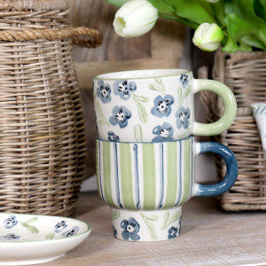 Isobel Green Stripe Mug, a practical vessel for drinks with decorative tabletop appeal