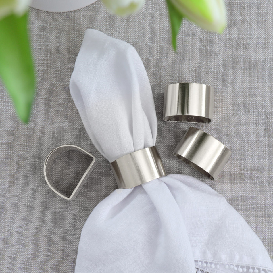 Set 4 Sorrento Silver Napkin Rings, a practical fabric accent for dressing and protecting a household surface