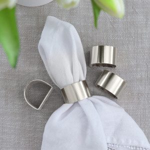Set 4 Sorrento Silver Napkin Rings, a practical fabric accent for dressing and protecting a household surface