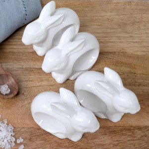 Set 4 White Bunny Napkin Rings, a practical fabric accent for dressing and protecting a household surface