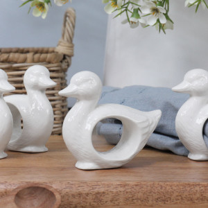 White duckling napkin ring styled as a playful dining-table accent