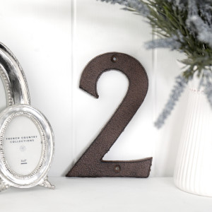 <h3>House Number Specifications</h3><ul><li>16 cm tall</li><li>10 cm wide</li><li>0.5 cm deep</li><li>Made from cast iron</li><li>Antique brown finish</li><li>Two pre-drilled mounting holes</li><li>Screws not included</li></ul><p>Note that measurements ar