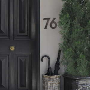 Antique brown cast iron Kew house number 6 with raised vintage detailing