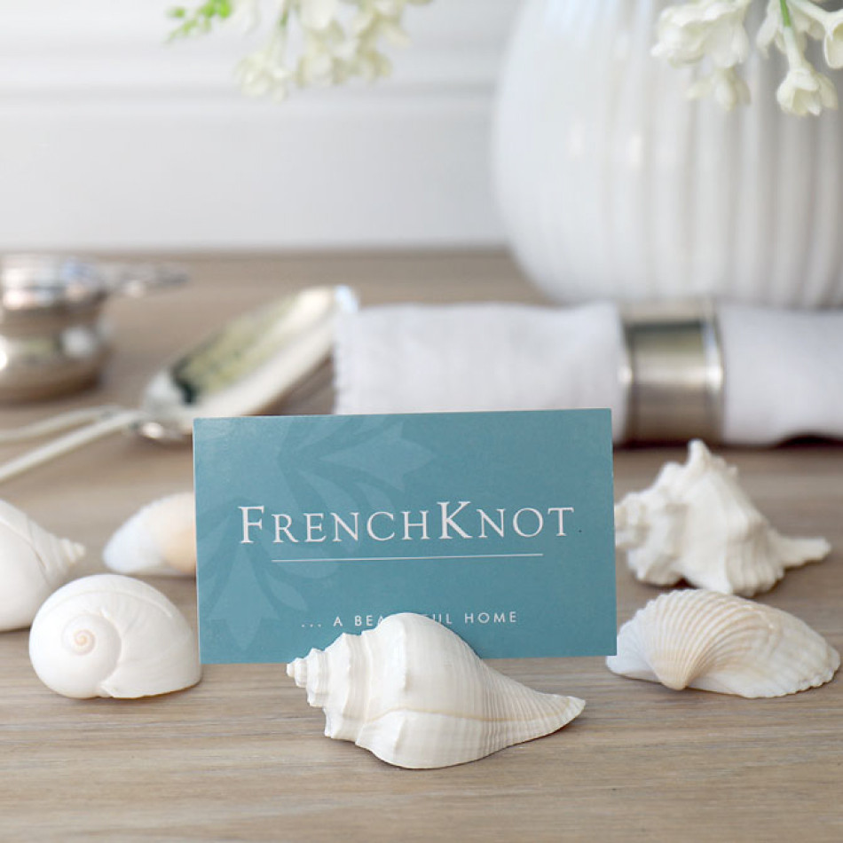 Set 8 Shell Placecard Holders, a functional household accessory for display or organisation