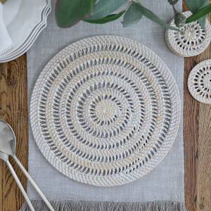 Fairlight Whitewash Rattan Placemat, a practical fabric accent for dressing and protecting a household surface