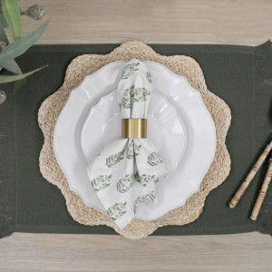 Set 4 Olive Bronte Fringe Placemats, a practical fabric accent for dressing and protecting a household surface