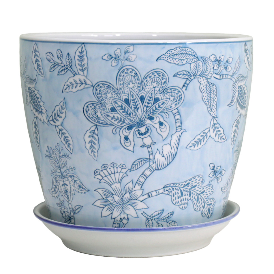 Large pale blue ceramic plant pot with intricate blue floral designs and a white saucer with blue edging