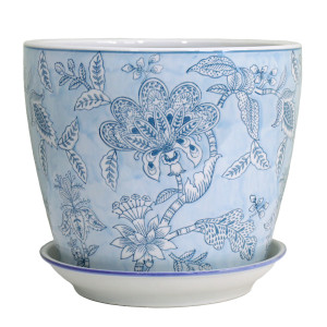 Large pale blue ceramic plant pot with intricate blue floral designs and a white saucer with blue edging