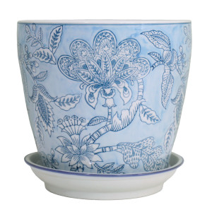 Medium Swanson Blue Lace ceramic plant pot with blue floral detail and a white saucer on a white background