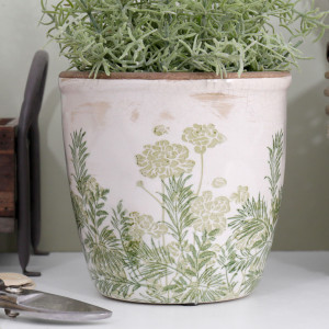 Close-up of the Large Glendale Rounded Plant Pot with soft green foliage, botanical detail and vintage crackle glaze