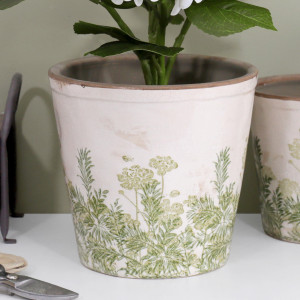 Glendale tapered plant pot holding hydrangea stems, with a smaller matching pot behind and secateurs in front