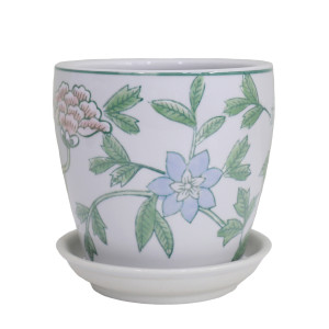 Extra small white ceramic plant pot with pink and pale blue flowers, green leaves and a matching saucer