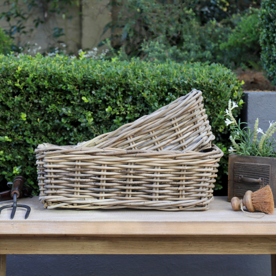Small Amalfi Rectangle Rattan Planter Basket, designed as a decorative container for a favourite plant