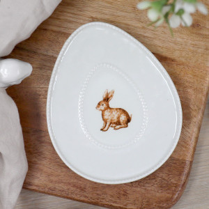 Close-up of the seated rabbit artwork and raised beaded border
