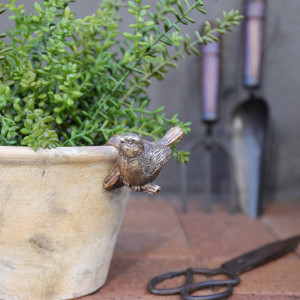 Finchley II Gold Bird Pot Hanger, designed to add practical storage or display space to the home
