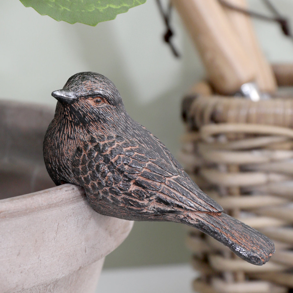 Close-up of Kendall Bird II vintage brown resin pot hanger showing layered wing feathers and a long tail