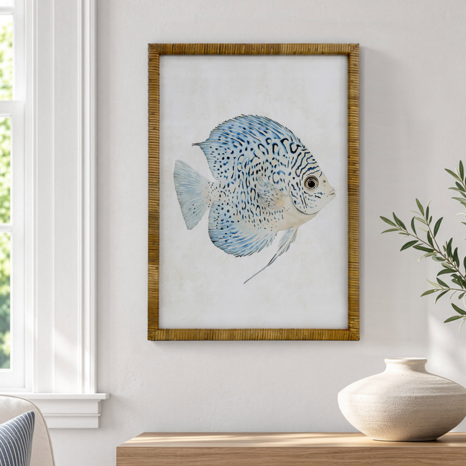 Coral Cove Fish I print beside a window, styled above a timber console with a cream vase and leafy stems