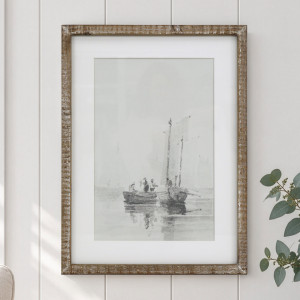 Falmouth Harbour I boat print in a rustic wood frame on a white panelled wall beside eucalyptus