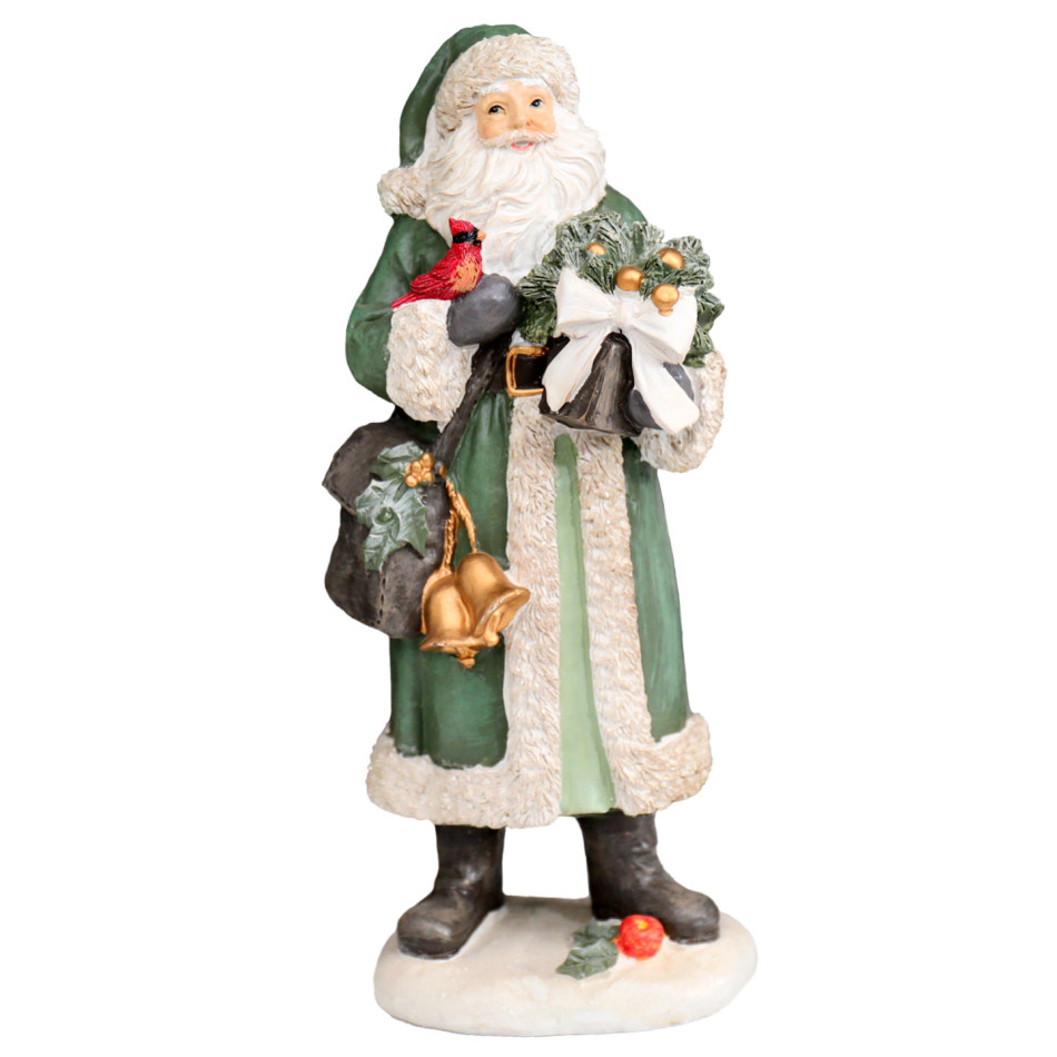 Resin Santa figurine in a green coat with cream trim, gold bells and a red bird against a white background