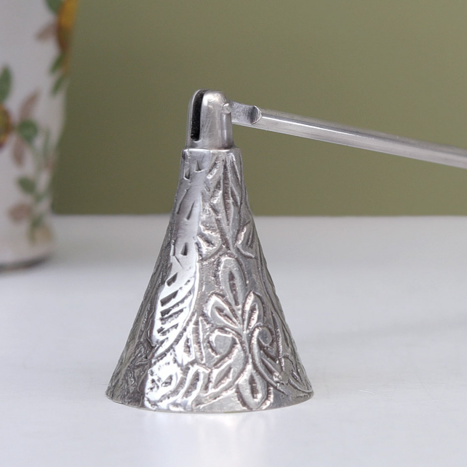 Les Fleur Silver Candle Snuffer, a decorative piece for displaying candlelight