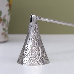 Les Fleur Silver Candle Snuffer, a decorative piece for displaying candlelight
