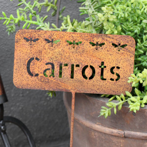 Rusty Carrots Garden Stake, highlighting the product's distinctive form and defining design