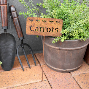 Rusty Carrots Garden Stake, presented as a standalone item for straightforward product identification
