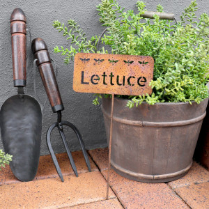 Rusty Lettuce Garden Stake, highlighting the product's distinctive form and defining design
