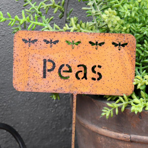 Rusty Peas Garden Stake, highlighting the product's distinctive form and defining design