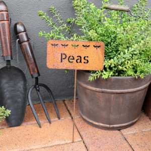 Rusty Peas Garden Stake, presented as a standalone item for straightforward product identification