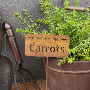 Rusty Carrots Garden Stake, shown as a standalone product for clear identification