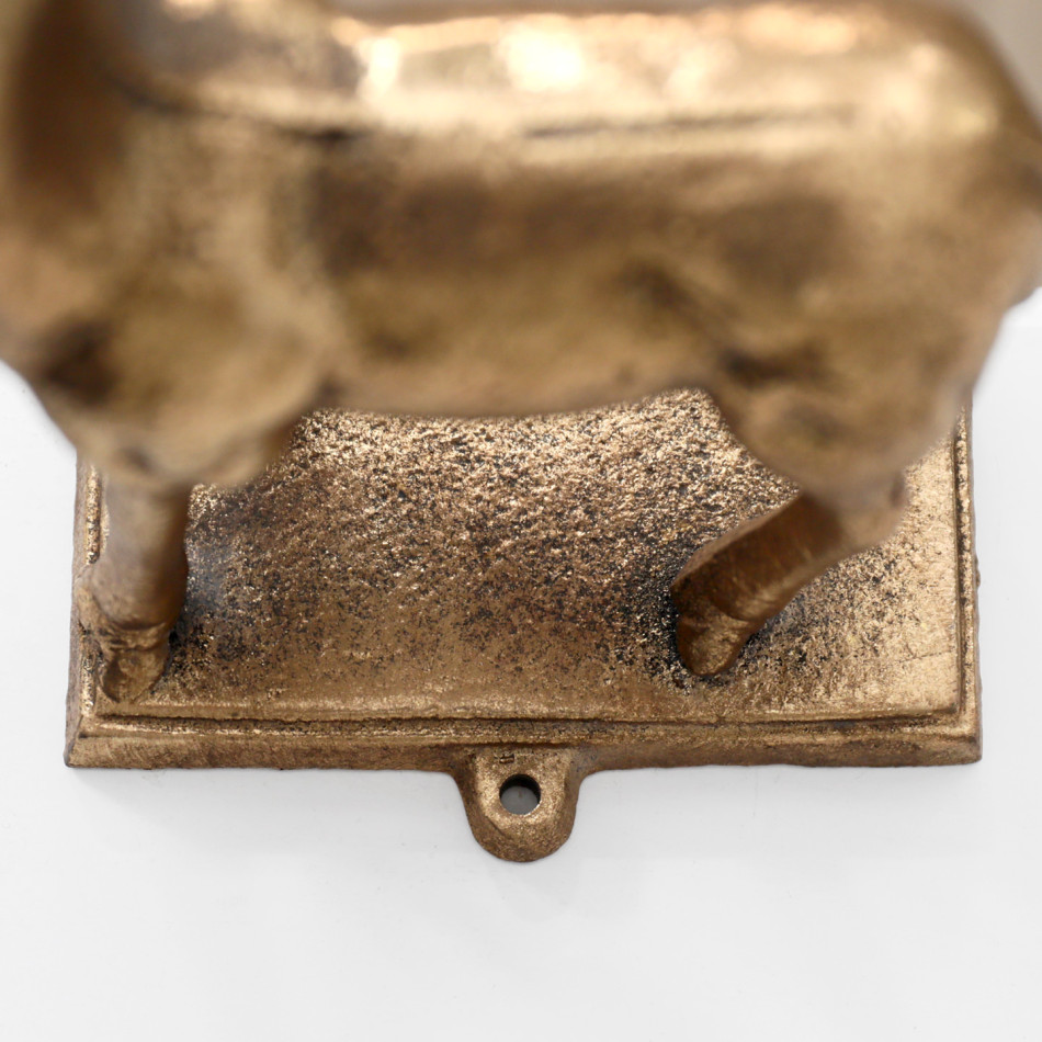 Close-up of the screw hole in the gold reindeer stocking hook base