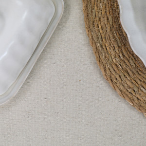 Oatmeal Wipe-Clean Tablecloth, a practical fabric accent for dressing and protecting a household surface