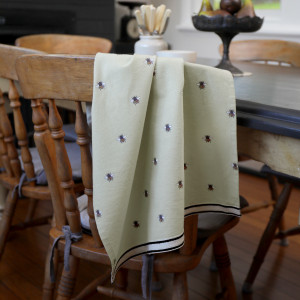 Clover Bee Kitchen Tea Towel, a practical fabric accent for dressing and protecting a household surface