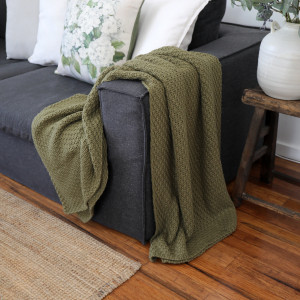 Jarah Olive Green Throw Blanket, highlighting the product's distinctive form and defining design