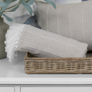 Brighton Taupe Chambray Cotton Throw, highlighting the product's distinctive form and defining design