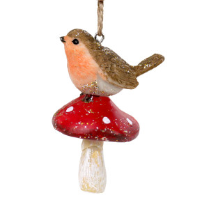 Close-up of robin tree decoration showing textured brown wings, orange-red breast and glittered toadstool on white