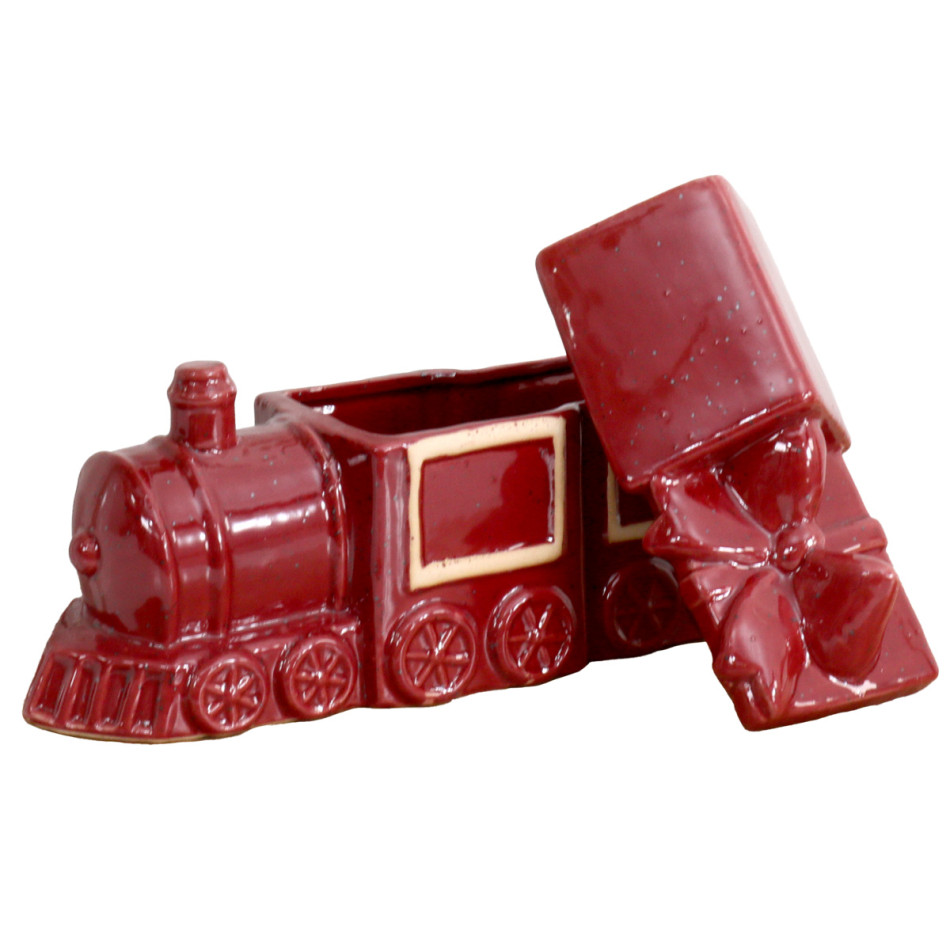 Red ceramic train trinket box with its removable roof-and-bow lid lifted off, showing the storage opening.