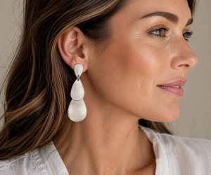 Carolina Silver Statement Drop Earrings, an ornamental accessory for adding a finishing detail to an outfit